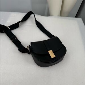 Black Crossbody Bag with Gold Accent